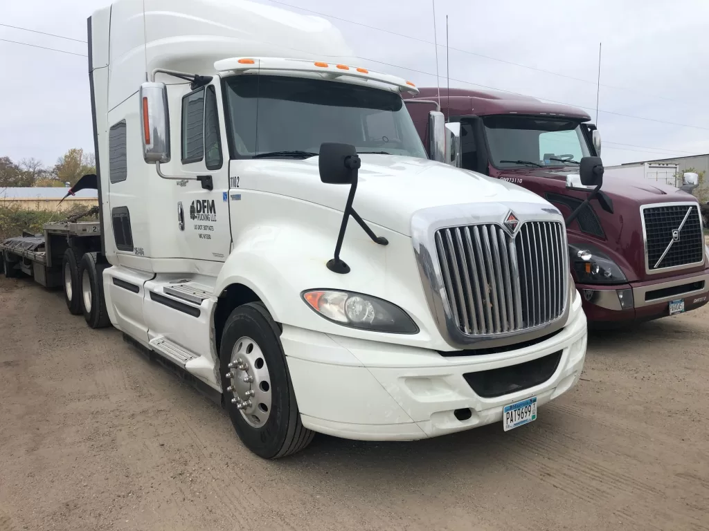 White DFM Trucking semi-truck